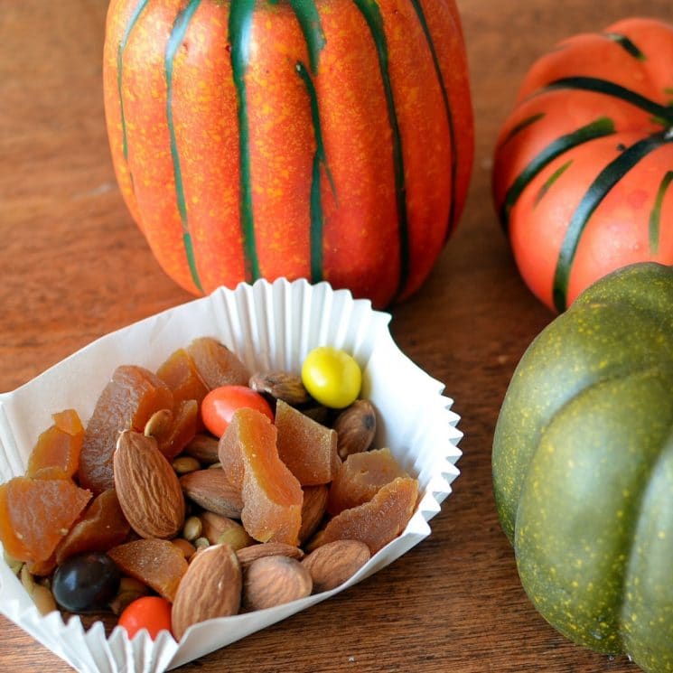 festive fall trail mix with almonds, apricots, and candies